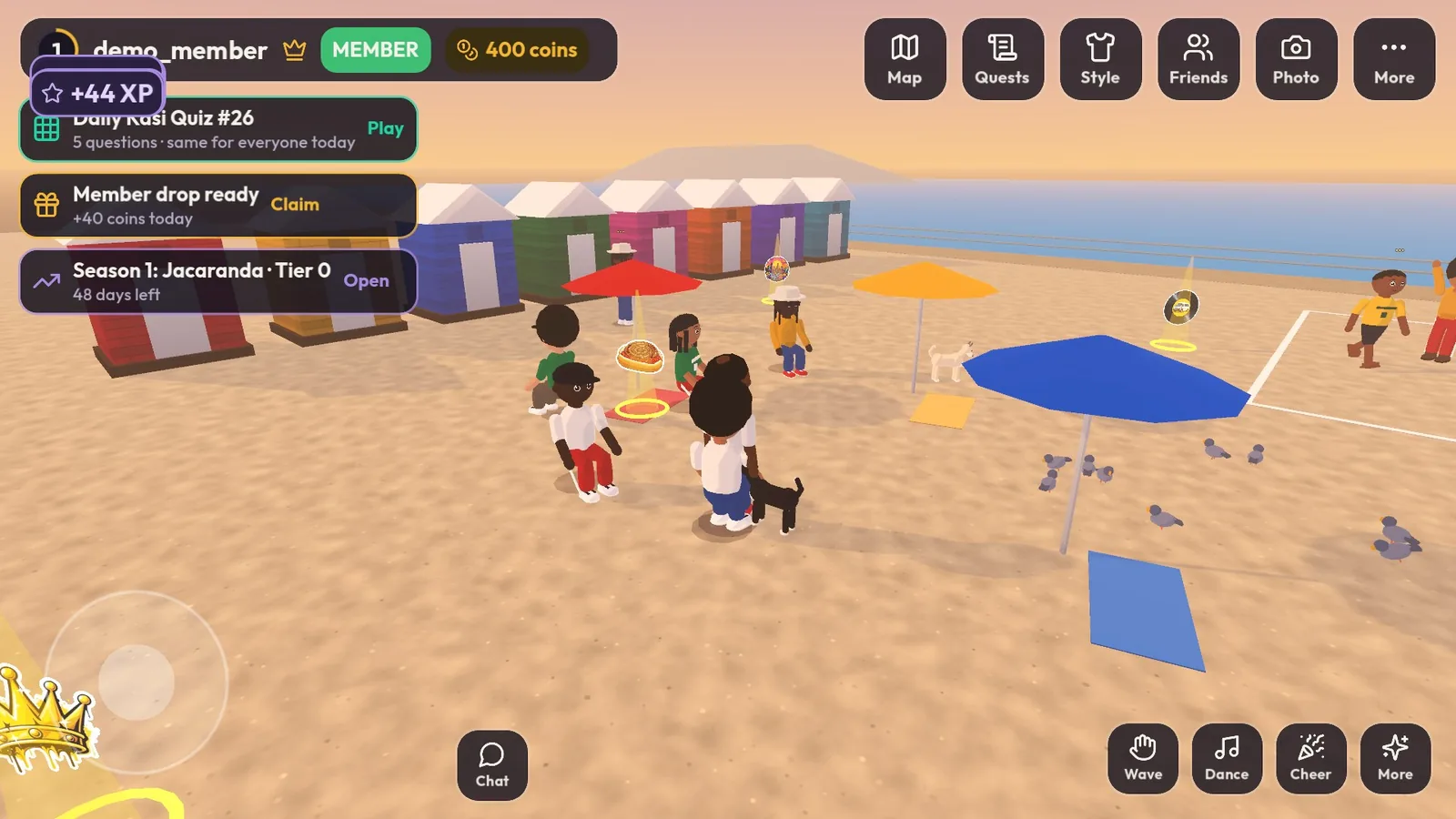 Players on the Beachfront in Kasi, beach huts and umbrellas behind them
